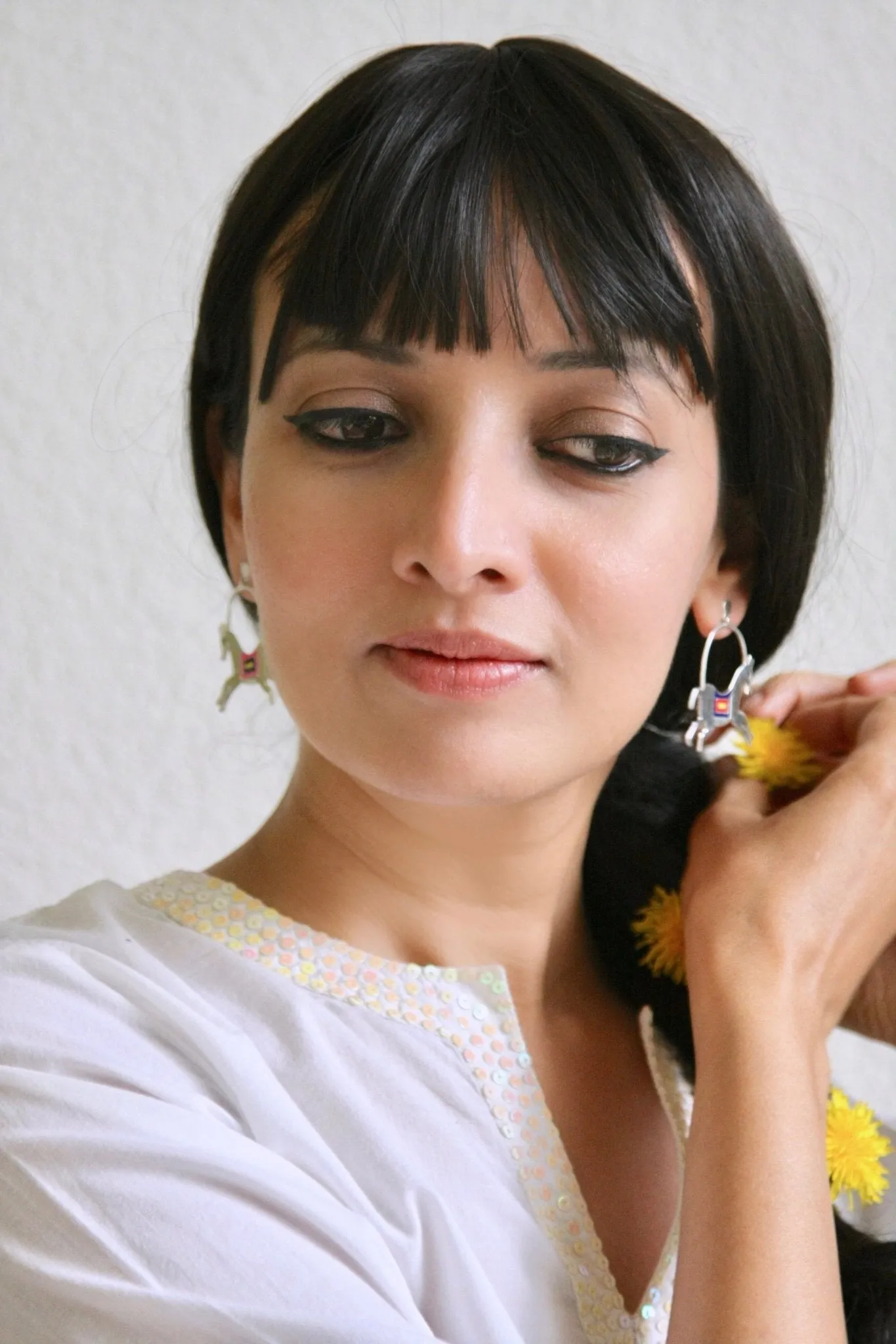 'The Ashwins'; whimsical prancing horse earrings